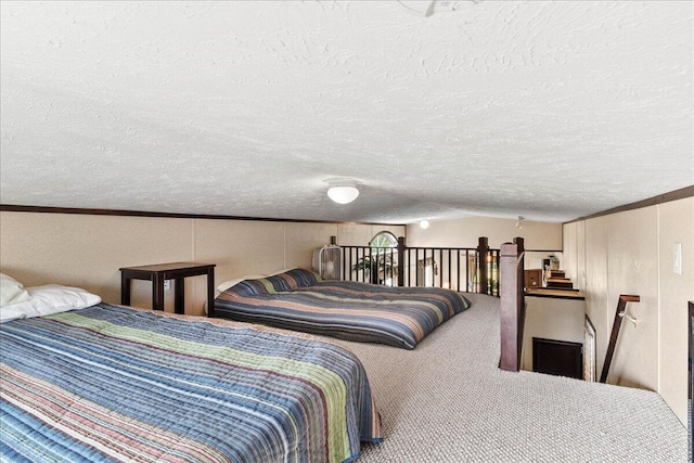 10950 Cherokee Dr Unit 59, Lakeview, OH 43331 - bedroom with a textured ceiling and carpet flooring