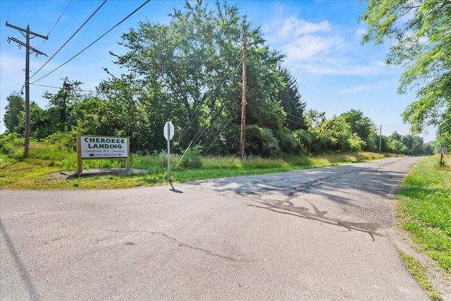 10950 Cherokee Dr Unit 59, Lakeview, OH 43331 - view of asphalt street with traffic signs