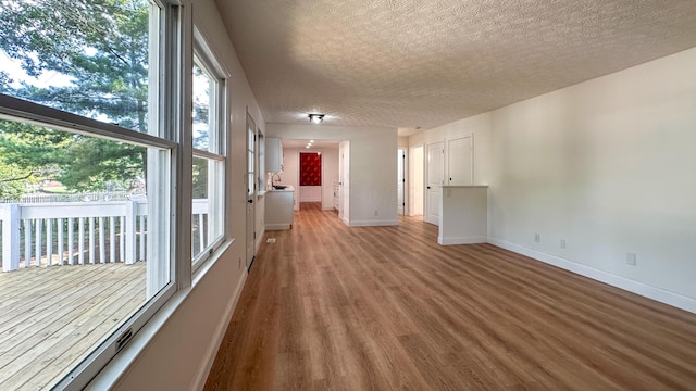 5078 Grassland Dr, Dublin, OH 43016 - spare room featuring light wood finished floors and a textured ceiling