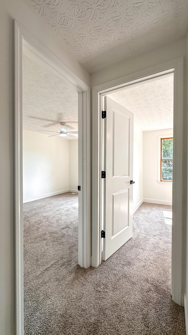 5078 Grassland Dr, Dublin, OH 43016 - hall with a textured ceiling and carpet