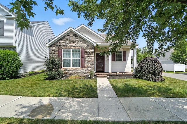 5804 Trail Creek Dr, Dublin, OH 43016 - view of front of property featuring stone siding and a front yard