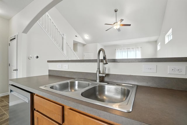 5804 Trail Creek Dr, Dublin, OH 43016 - kitchen featuring ceiling fan, dishwasher, vaulted ceiling, dark countertops, and brown cabinetry