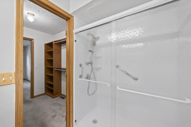 1280 Gemstone Sq W, Westerville, OH 43081 - bathroom featuring a stall shower and a textured ceiling