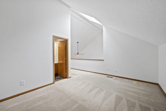 1280 Gemstone Sq W, Westerville, OH 43081 - additional living space with lofted ceiling, carpet, and a textured ceiling