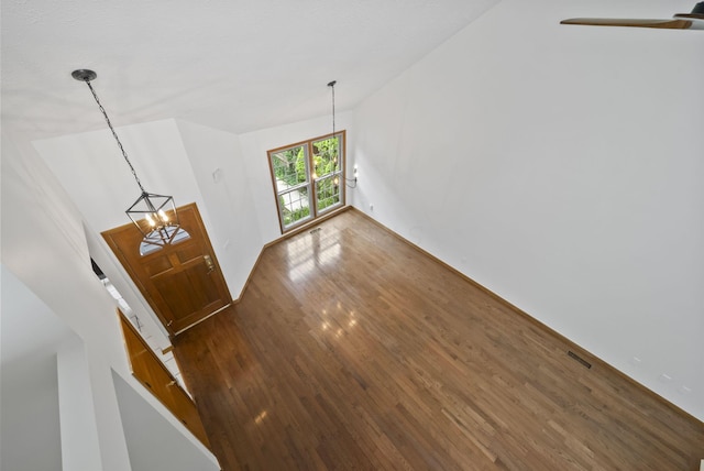 1280 Gemstone Sq W, Westerville, OH 43081 - unfurnished living room featuring wood finished floors and a chandelier