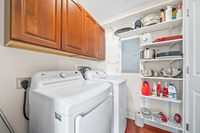 1475 W 3rd Ave Unit 401, Columbus, OH 43212 - laundry room featuring cabinet space, washer and dryer, and electric panel