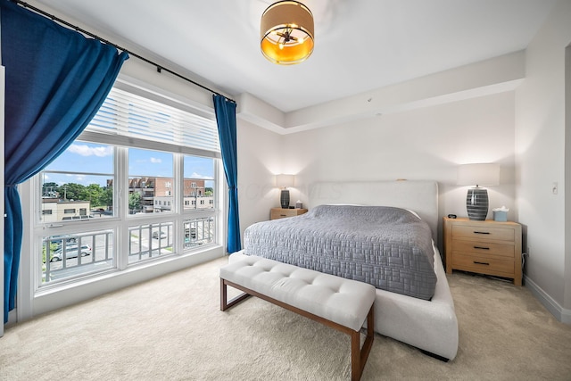 1475 W 3rd Ave Unit 401, Columbus, OH 43212 - carpeted bedroom featuring multiple windows