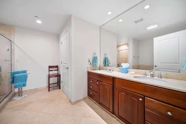 1475 W 3rd Ave Unit 401, Columbus, OH 43212 - full bathroom with a stall shower, double vanity, tile patterned flooring, and recessed lighting