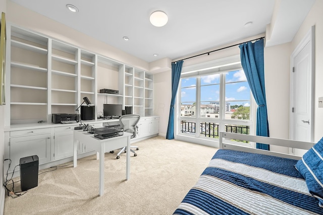 1475 W 3rd Ave Unit 401, Columbus, OH 43212 - bedroom with light colored carpet, an office area, and access to outside