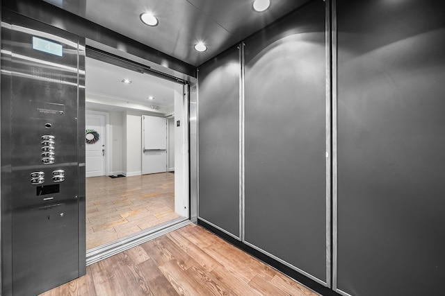 1475 W 3rd Ave Unit 401, Columbus, OH 43212 - hallway with elevator and recessed lighting