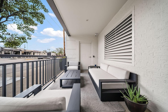 1475 W 3rd Ave Unit 401, Columbus, OH 43212 - balcony featuring an outdoor living space