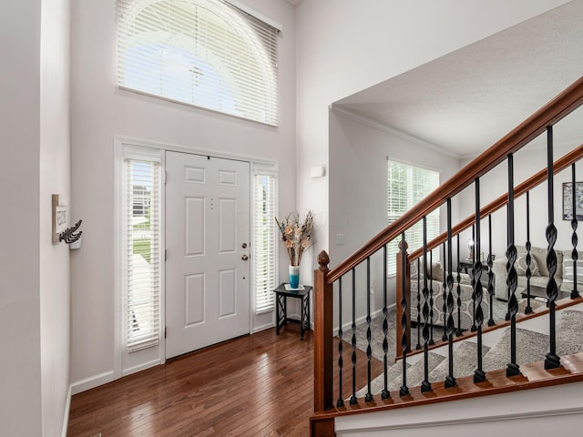 3012 Coltsbridge Dr, Lewis Center, OH 43035 - entrance foyer with a high ceiling, hardwood / wood-style floors, stairway, and crown molding