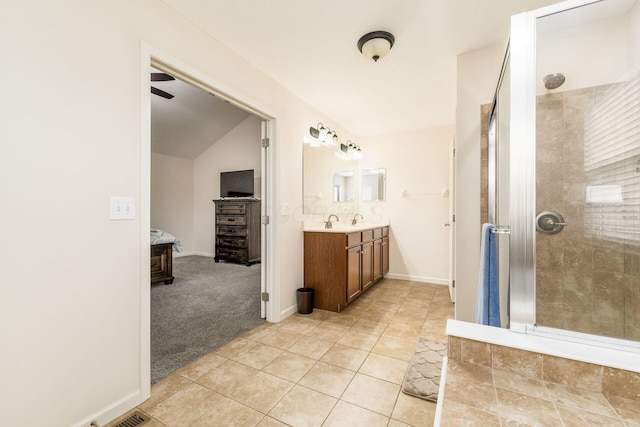3012 Coltsbridge Dr, Lewis Center, OH 43035 - bathroom featuring vanity, a tile shower, and tile patterned flooring