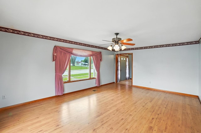 24 W High St, Jeffersonville, OH 43128 - spare room featuring wood finished floors and ceiling fan