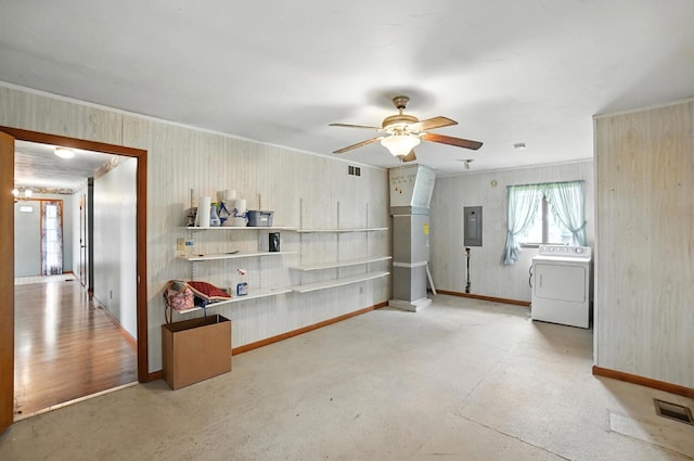 24 W High St, Jeffersonville, OH 43128 - interior space featuring ceiling fan, washer / clothes dryer, crown molding, electric panel, and wooden walls