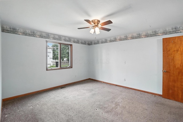 24 W High St, Jeffersonville, OH 43128 - unfurnished room featuring carpet floors and a ceiling fan