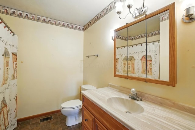 24 W High St, Jeffersonville, OH 43128 - bathroom with vanity and toilet