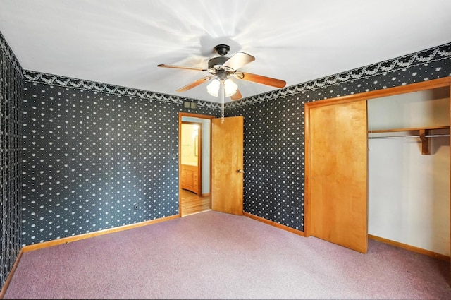 24 W High St, Jeffersonville, OH 43128 - unfurnished bedroom featuring wallpapered walls, a closet, carpet floors, and ceiling fan