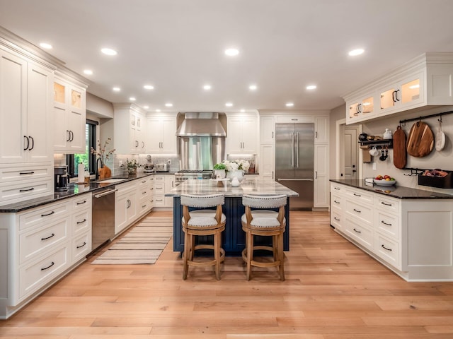 5767 Loch Maree Ct, Dublin, OH 43017 - kitchen with stainless steel appliances, white cabinetry, backsplash, and recessed lighting