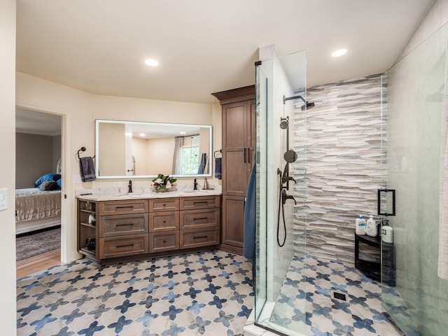 5767 Loch Maree Ct, Dublin, OH 43017 - bathroom featuring double vanity, a stall shower, ensuite bathroom, recessed lighting, and tile patterned floors