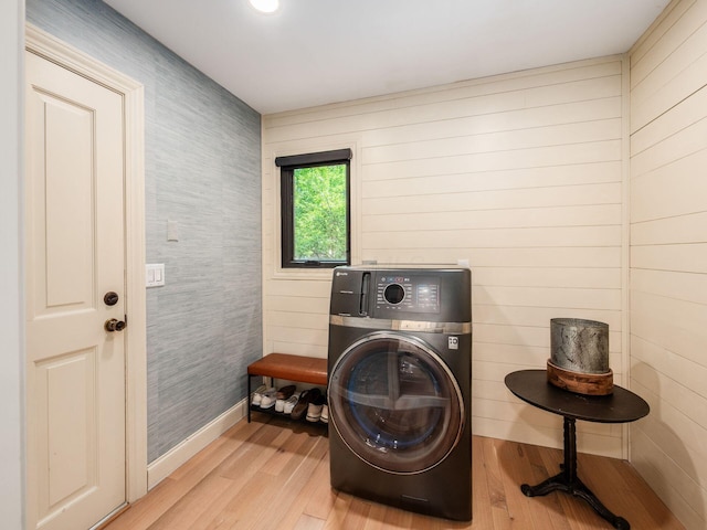 5767 Loch Maree Ct, Dublin, OH 43017 - laundry room featuring washer / dryer and light wood-style flooring