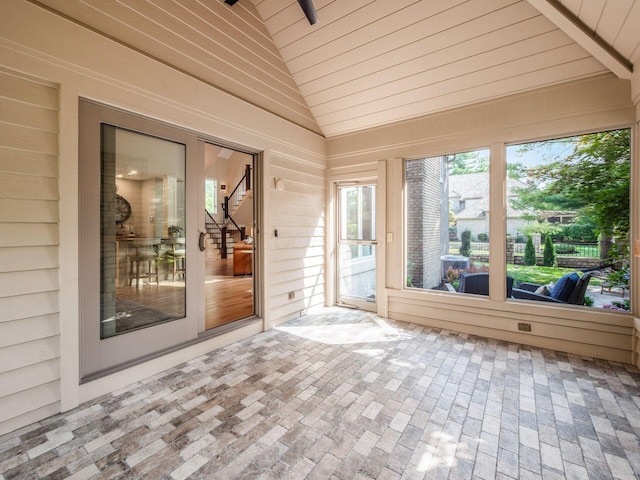 5767 Loch Maree Ct, Dublin, OH 43017 - unfurnished sunroom featuring lofted ceiling, wooden ceiling, and brick patterned floors
