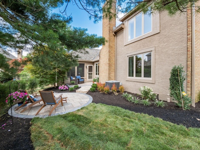 5767 Loch Maree Ct, Dublin, OH 43017 - view of grassy yard with a patio and an outdoor living space