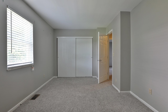 7617 Whitneyway Dr Unit 120, Columbus, OH 43085 - unfurnished bedroom with carpet and a closet