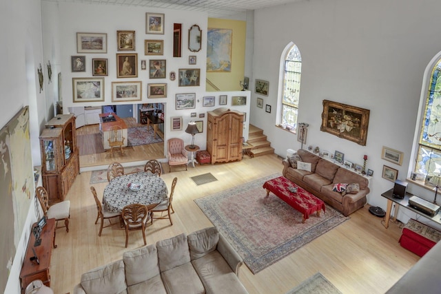 131 E Chestnut St, Lancaster, OH 43130 - living area featuring plenty of natural light, wood finished floors, and stairs