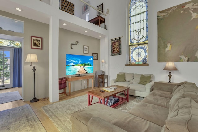 131 E Chestnut St, Lancaster, OH 43130 - living room featuring wood finished floors, a towering ceiling, and recessed lighting
