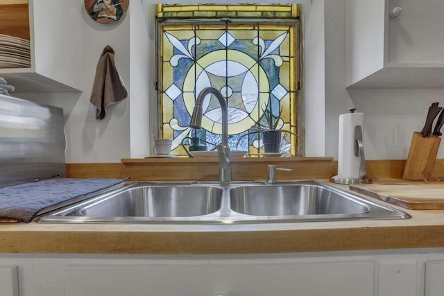 131 E Chestnut St, Lancaster, OH 43130 - kitchen view of white cabinetry and light countertops