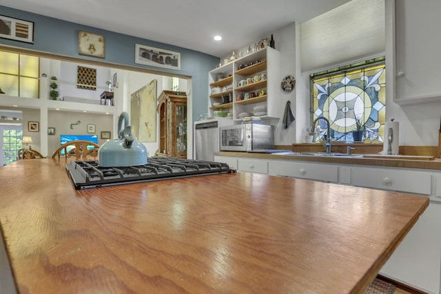 131 E Chestnut St, Lancaster, OH 43130 - kitchen with open shelves, wooden counters, recessed lighting, and stainless steel gas stovetop