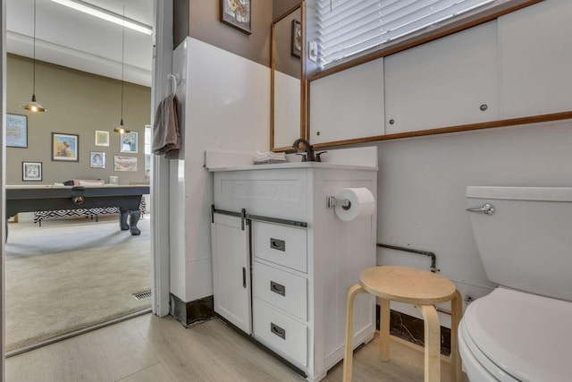 131 E Chestnut St, Lancaster, OH 43130 - bathroom with toilet and wood finished floors