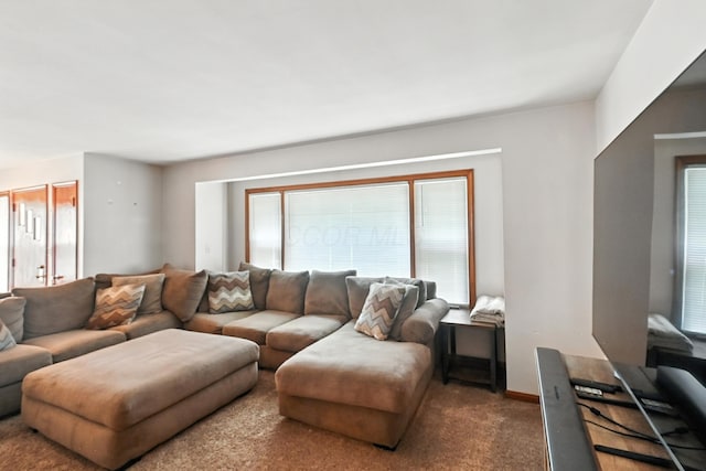 305 N Boston St, Galion, OH 44833 - carpeted living area featuring plenty of natural light