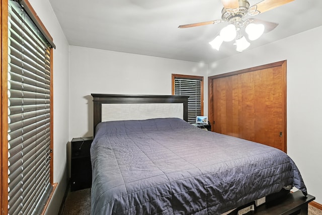 305 N Boston St, Galion, OH 44833 - carpeted bedroom featuring a ceiling fan and a closet