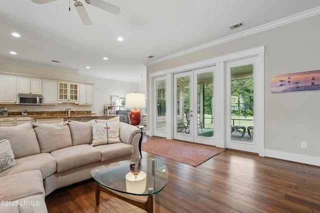 27 Normandy Ave, Bluffton, SC 29910 - living area featuring ornamental molding, recessed lighting, a ceiling fan, dark wood-style floors, and french doors