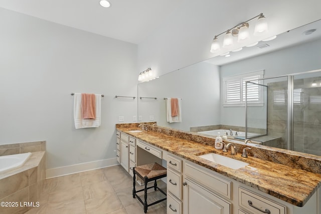 27 Normandy Ave, Bluffton, SC 29910 - bathroom with a garden tub, a shower stall, double vanity, and baseboards
