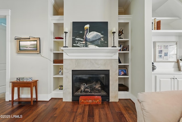 27 Normandy Ave, Bluffton, SC 29910 - living room with wood finished floors, crown molding, a fireplace, built in features, and baseboards