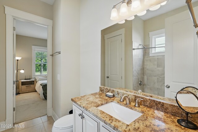 27 Normandy Ave, Bluffton, SC 29910 - ensuite bathroom featuring tile patterned floors, vanity, tiled shower, toilet, and baseboards