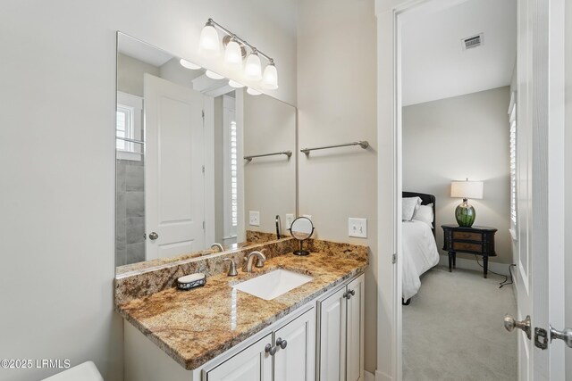 27 Normandy Ave, Bluffton, SC 29910 - ensuite bathroom featuring vanity and baseboards