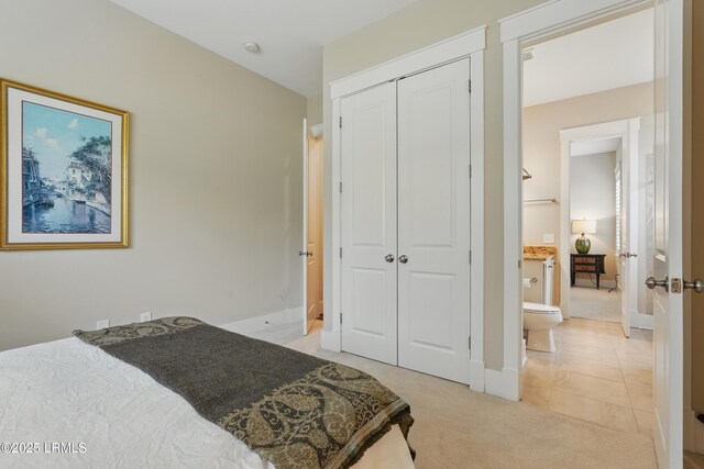 27 Normandy Ave, Bluffton, SC 29910 - bedroom featuring light carpet, a closet, and baseboards