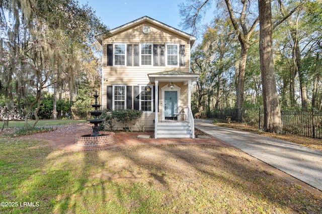 view of front of property with fence