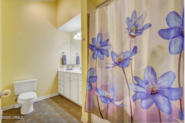 1980 Abbey Glen Way Unit 1980, Hardeeville, SC 29927 - bathroom featuring tile patterned floors, toilet, baseboards, and vanity