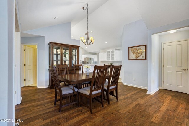 1980 Abbey Glen Way Unit 1980, Hardeeville, SC 29927 - dining area featuring high vaulted ceiling, recessed lighting, an inviting chandelier, dark wood-style flooring, and baseboards