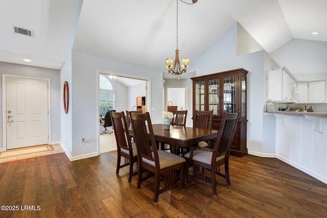 1980 Abbey Glen Way Unit 1980, Hardeeville, SC 29927 - dining room featuring visible vents, dark wood-style floors, and vaulted ceiling