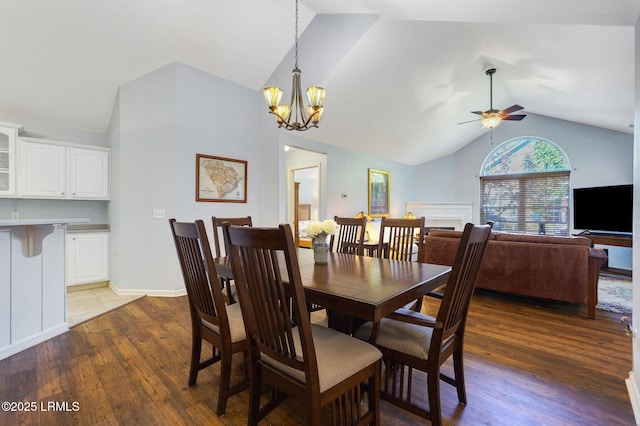 1980 Abbey Glen Way Unit 1980, Hardeeville, SC 29927 - dining room with ceiling fan with notable chandelier, high vaulted ceiling, and wood finished floors