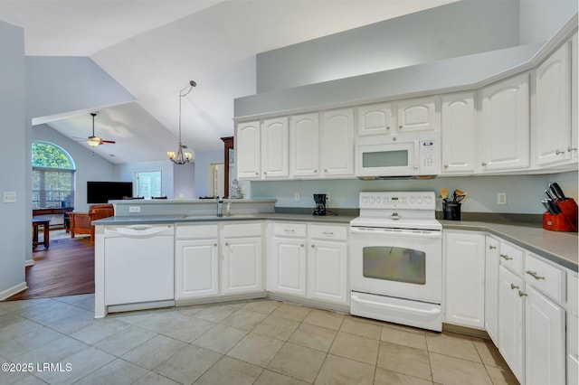 1980 Abbey Glen Way Unit 1980, Hardeeville, SC 29927 - kitchen with decorative light fixtures, white appliances, a sink, open floor plan, and a peninsula