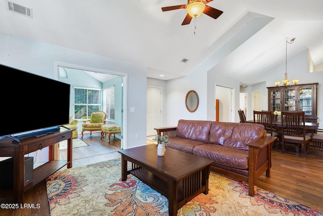 1980 Abbey Glen Way Unit 1980, Hardeeville, SC 29927 - living room with vaulted ceiling, wood finished floors, visible vents, and ceiling fan with notable chandelier