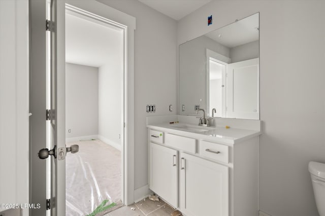 1 Alumni Rd, Beaufort, SC 29907 - half bathroom featuring toilet, baseboards, and vanity