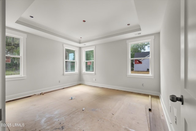1 Alumni Rd, Beaufort, SC 29907 - spare room with plenty of natural light, a tray ceiling, and visible vents